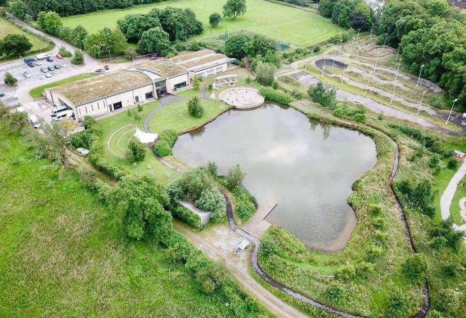 Aerial view of TCR Hub in Barnard Castle with the lake beside the main buildings